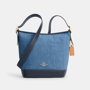 Coach Outlet Jude Duffle Bag In Signature Denim
